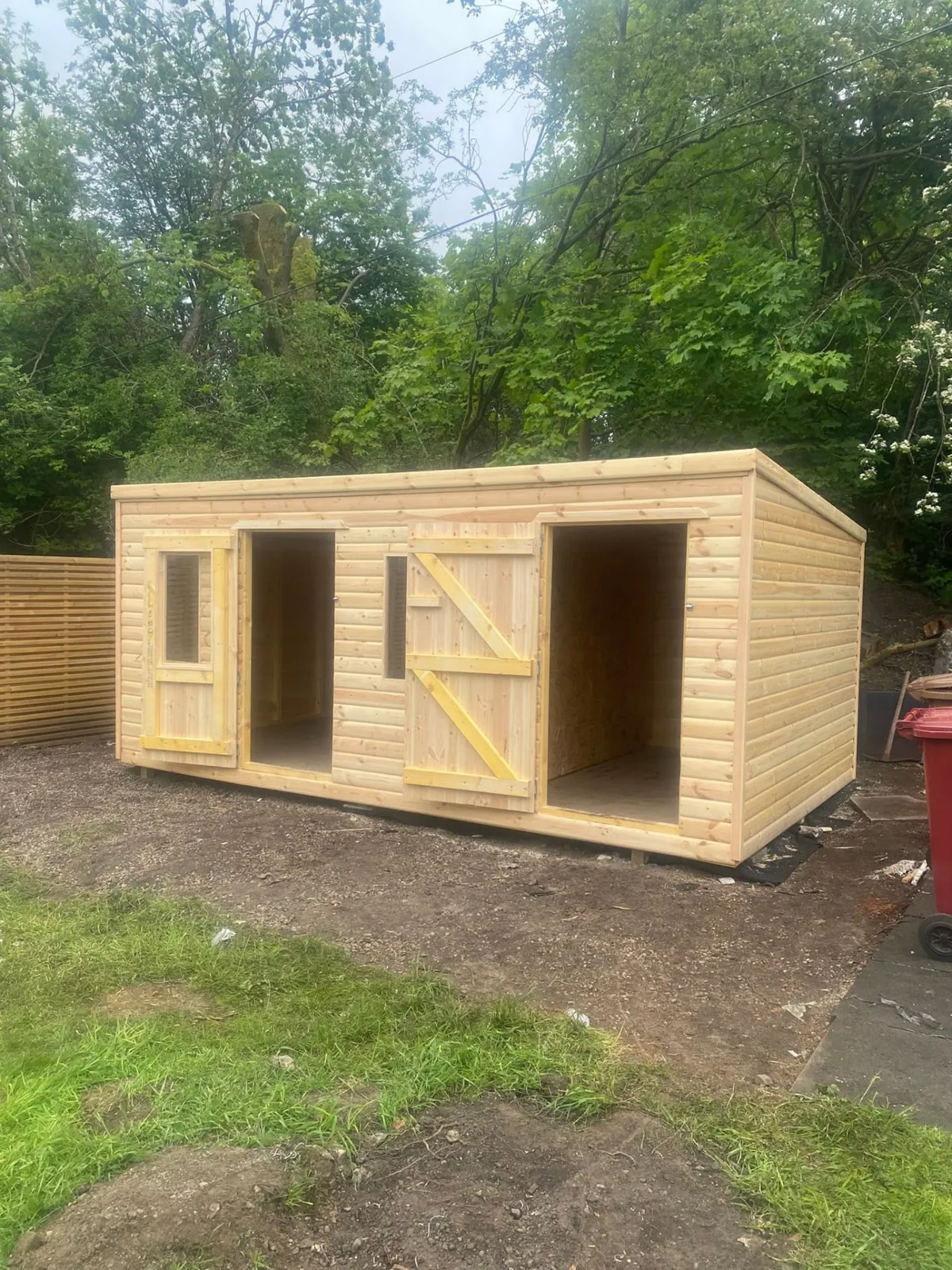 Large double-entry timber garden building