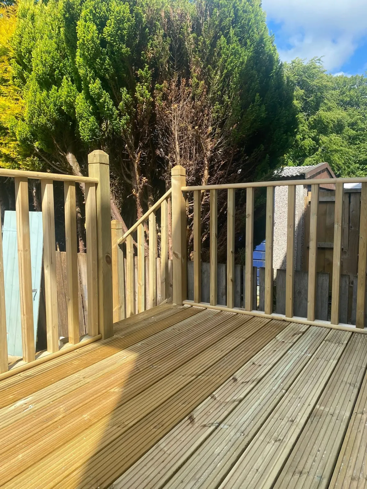 Raised timber decking with spindle balustrade